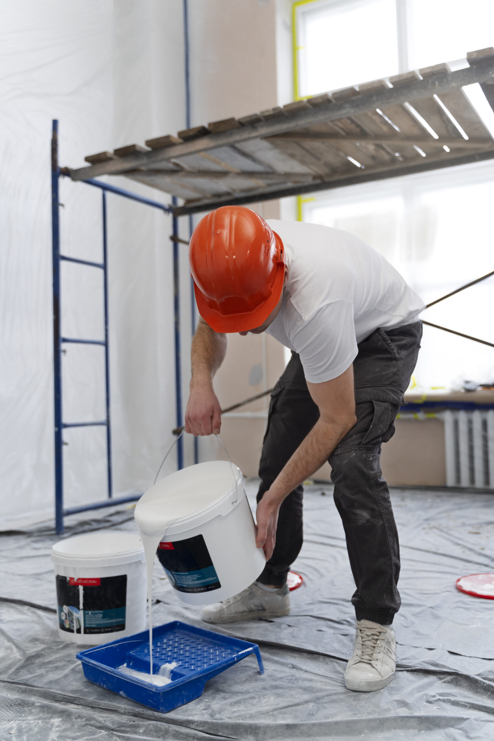 full-shot-man-pouring-paint